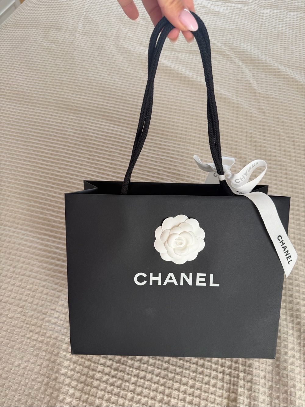CHANEL Black Shopping Bag with White Camellia and Ribbon